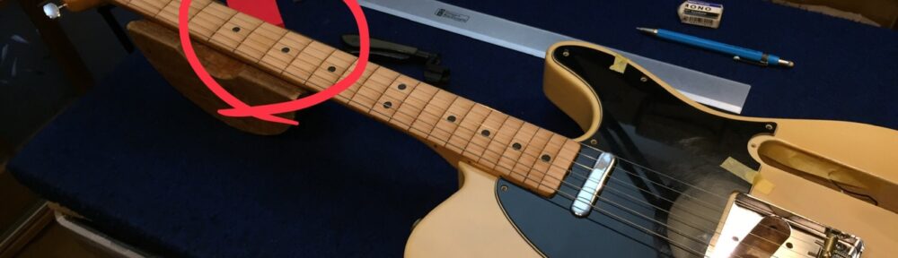 6フレット付近を削るしかない