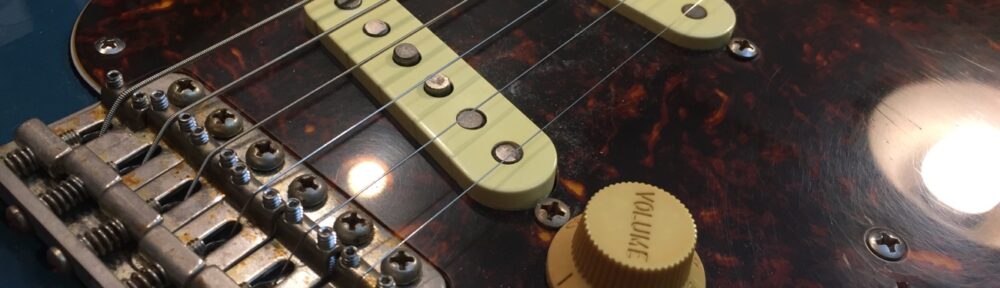 ピックアップの高さ調整