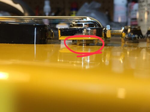 弦高が下がりきらない